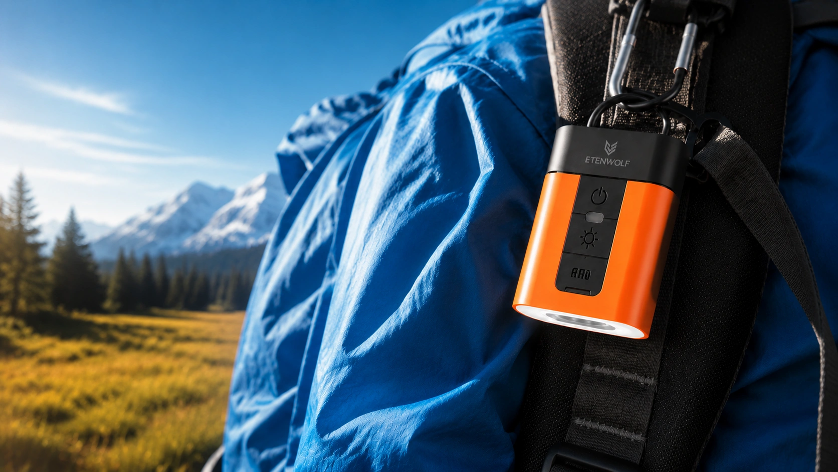 ETENWOLF Air 3 portable electric air pump and camping light hanging on a blue outdoor backpack