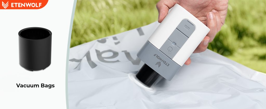 ETENWOLF AIR 5 using a specialized suction nozzle to deflate vacuum storage bags for space-saving.