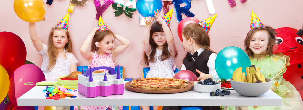 Children celebrating a birthday party with pizza, balloons, and a purple electric balloon pump