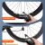 ETENWOLF S0 portable electric bike pump showing compatibility with both Schrader and Presta valves using the included adapter for all bicycle types.