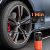 ETENWOLF S1 portable air compressor inflating a car tire