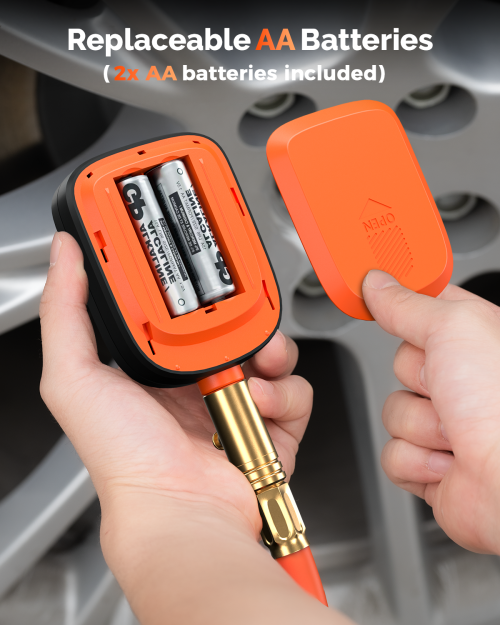 Close-up of ETENWOLF T600 battery compartment showing two replaceable AA batteries. The kit includes 2 batteries for immediate use out of the box.
