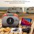 ETENWOLF Vortex S6 acting as a portable power bank to charge an iPad and phone during a seaside RV camping trip