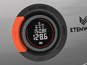 Close-up of ETENWOLF Vortex S7 digital display showing tire pressure, battery level, and smart inflation modes.