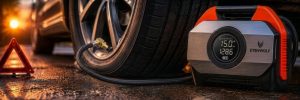 Using a portable air compressor during a flat tire emergency