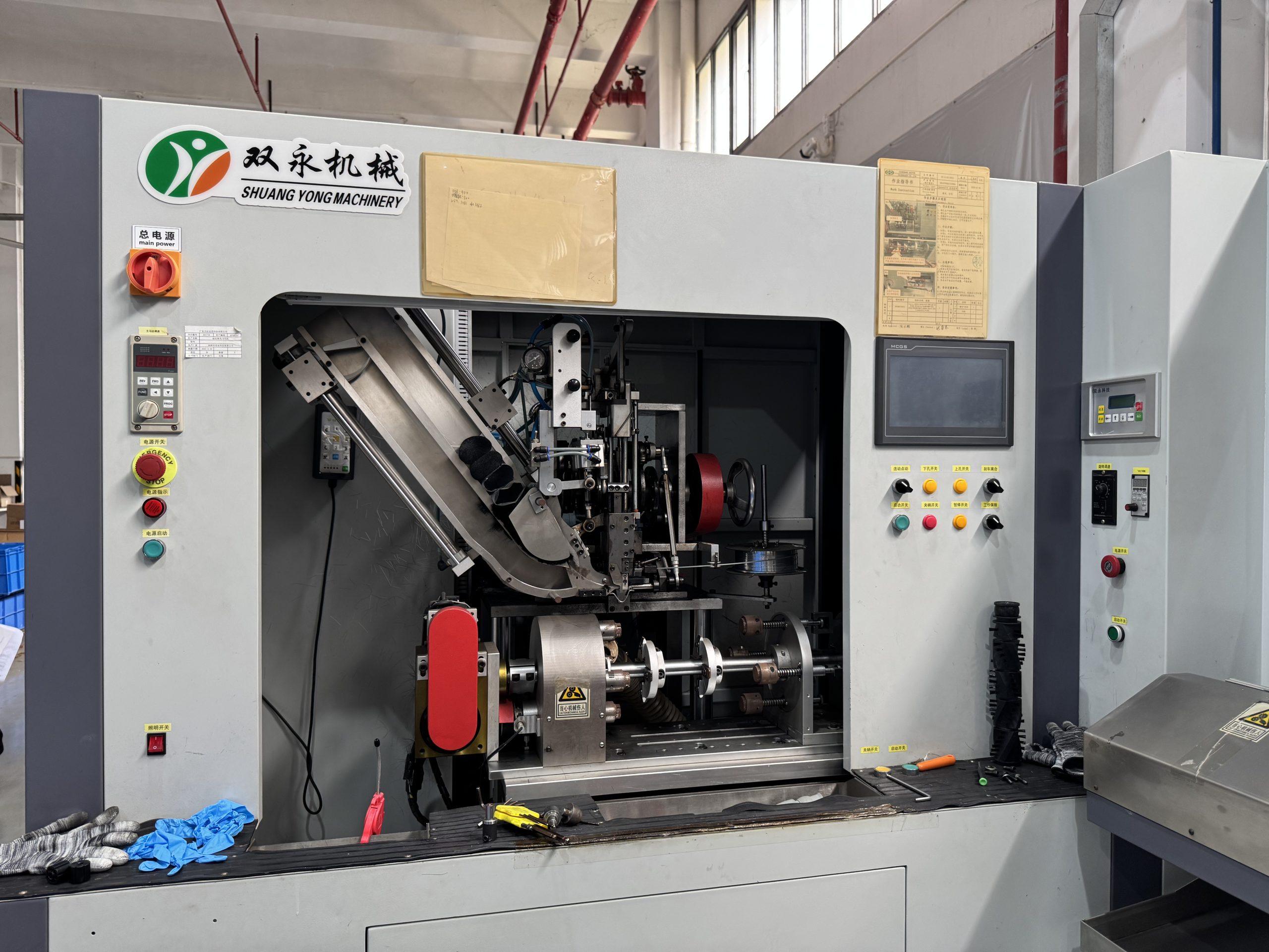 Front operation console of Shuangyong Machinery drilling, tufting, and trimming machine at ETENWOLF factory.