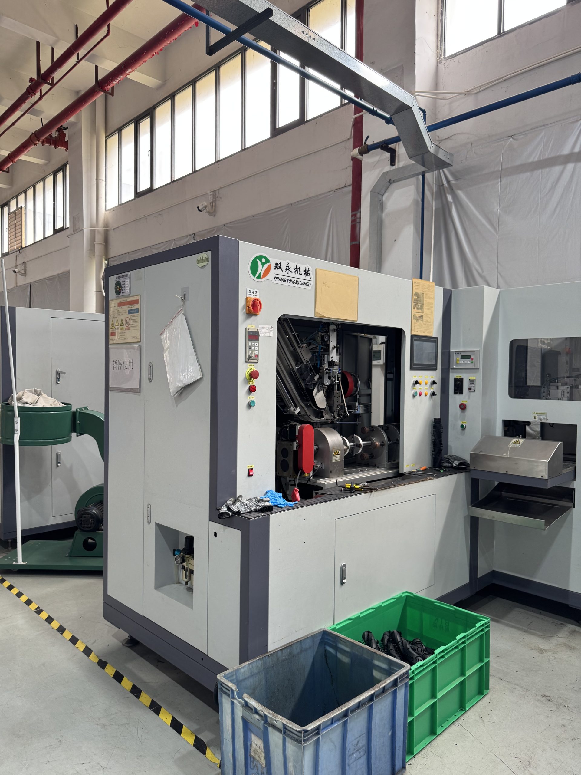 Shuangyong Machinery automatic drilling, tufting, and trimming machine at ETENWOLF factory.