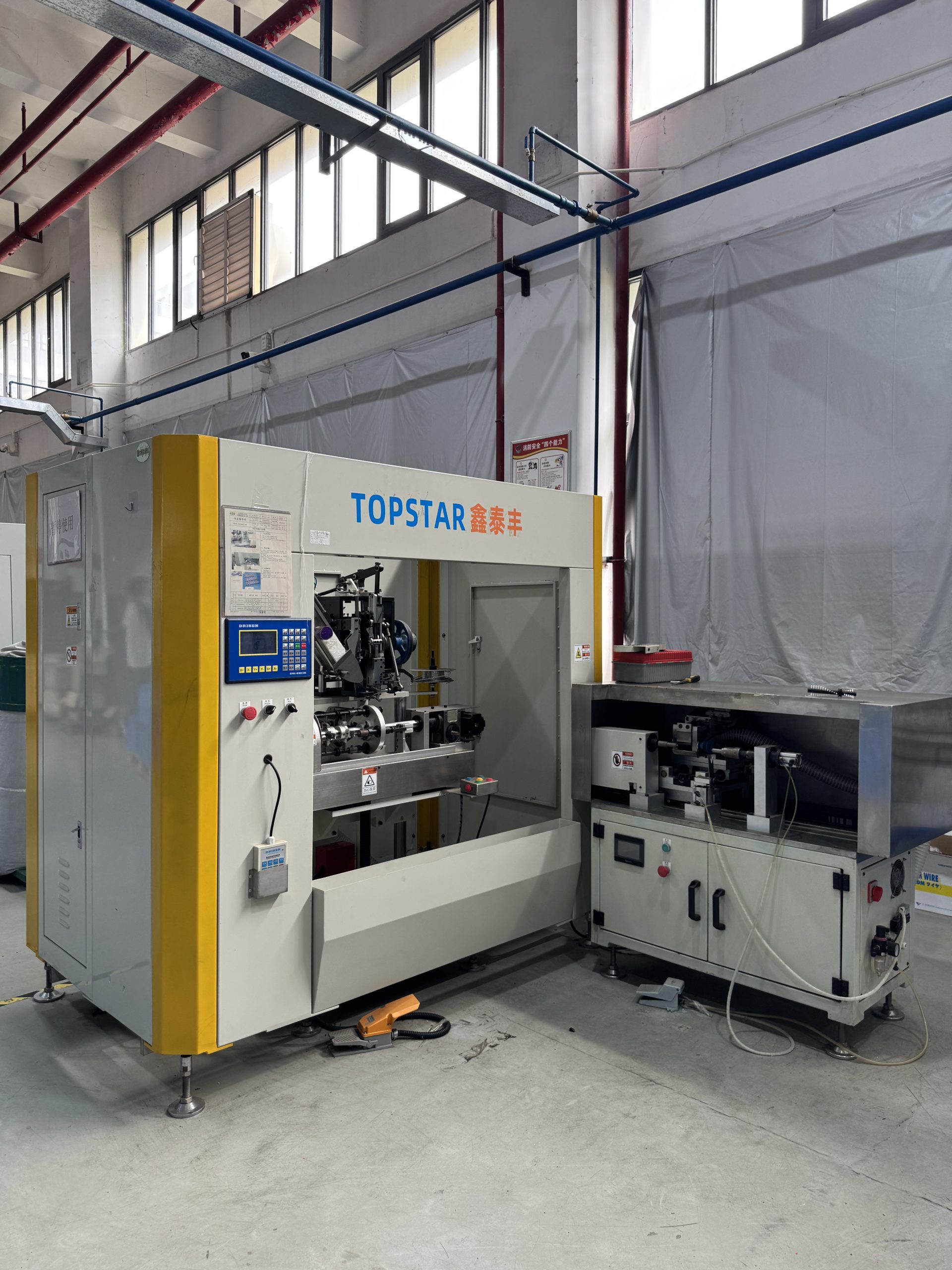 Full view of Xintaifeng Topstar automatic CNC tufting machine at ETENWOLF factory.