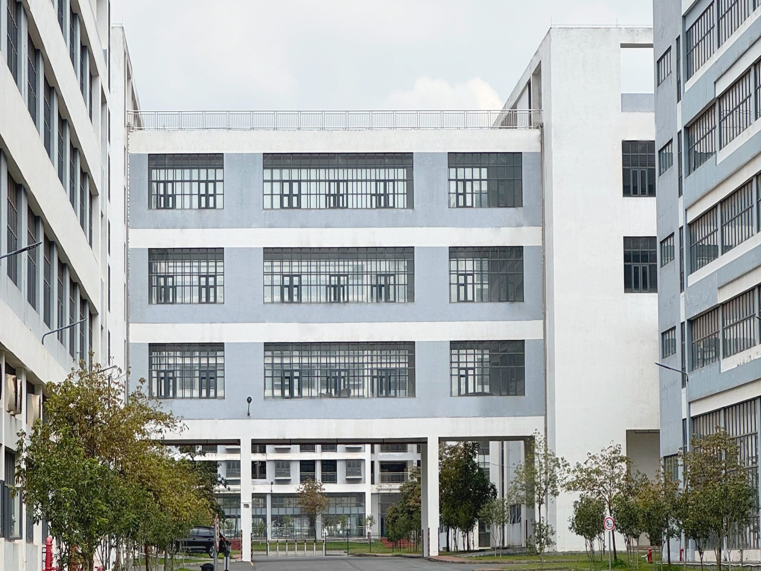 ETENWOLF modern industrial facility showcasing interconnected factory buildings and campus roads.