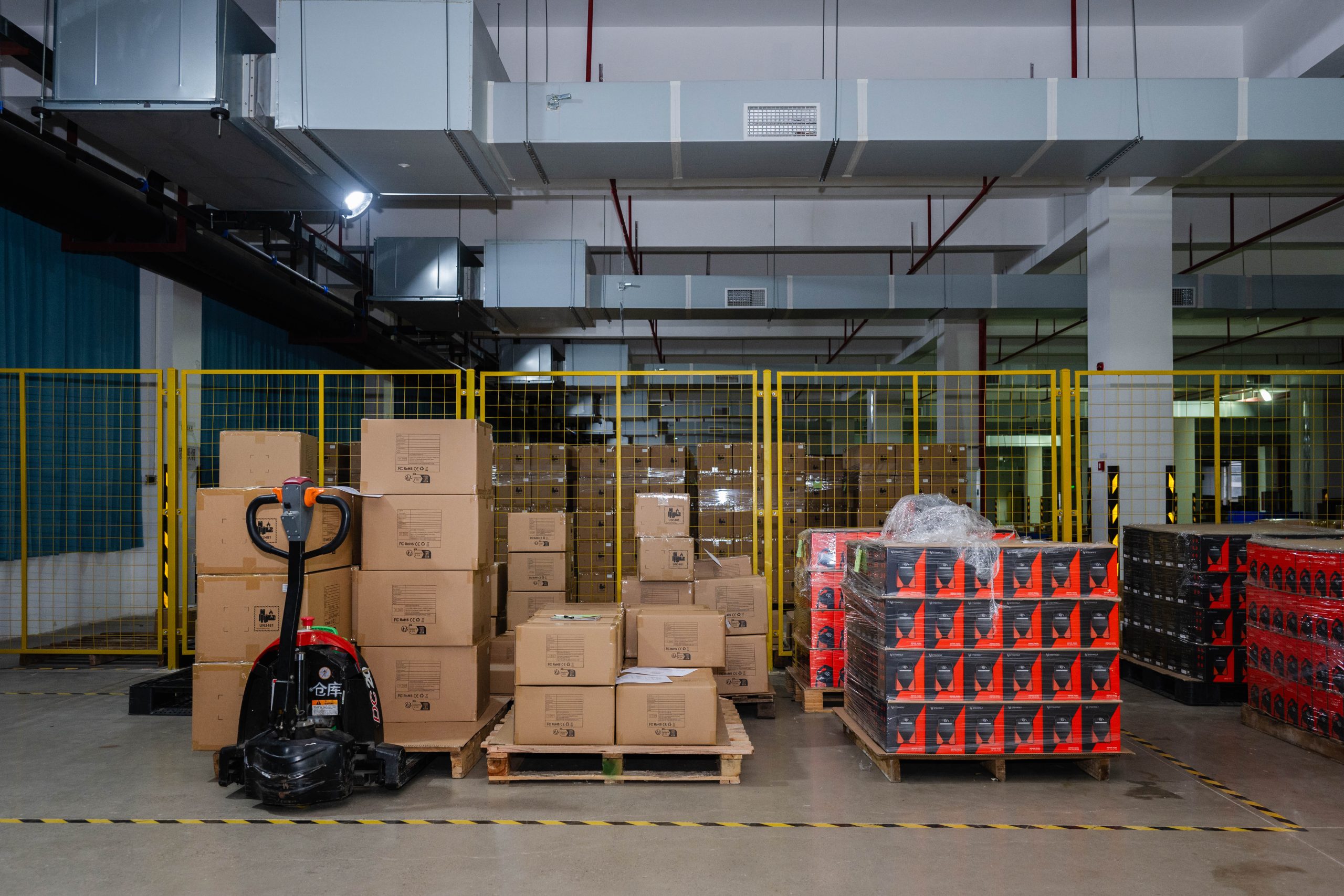 The organized storage and fulfillment area inside ETENWOLF warehouse showing packaged inventory ready for global B2B shipping.