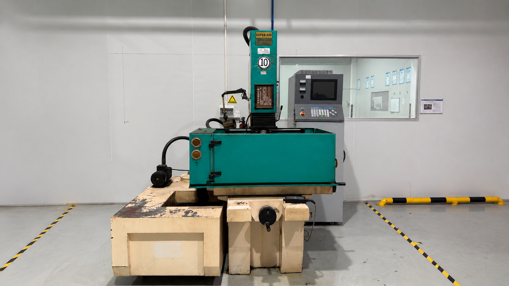 ETENWOLF industrial gear used for maintaining a classic SUPER-430 die sinking EDM machine tool on the factory floor